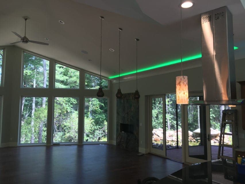 Living room with floor-to-ceiling windows in ICF-built Green River home